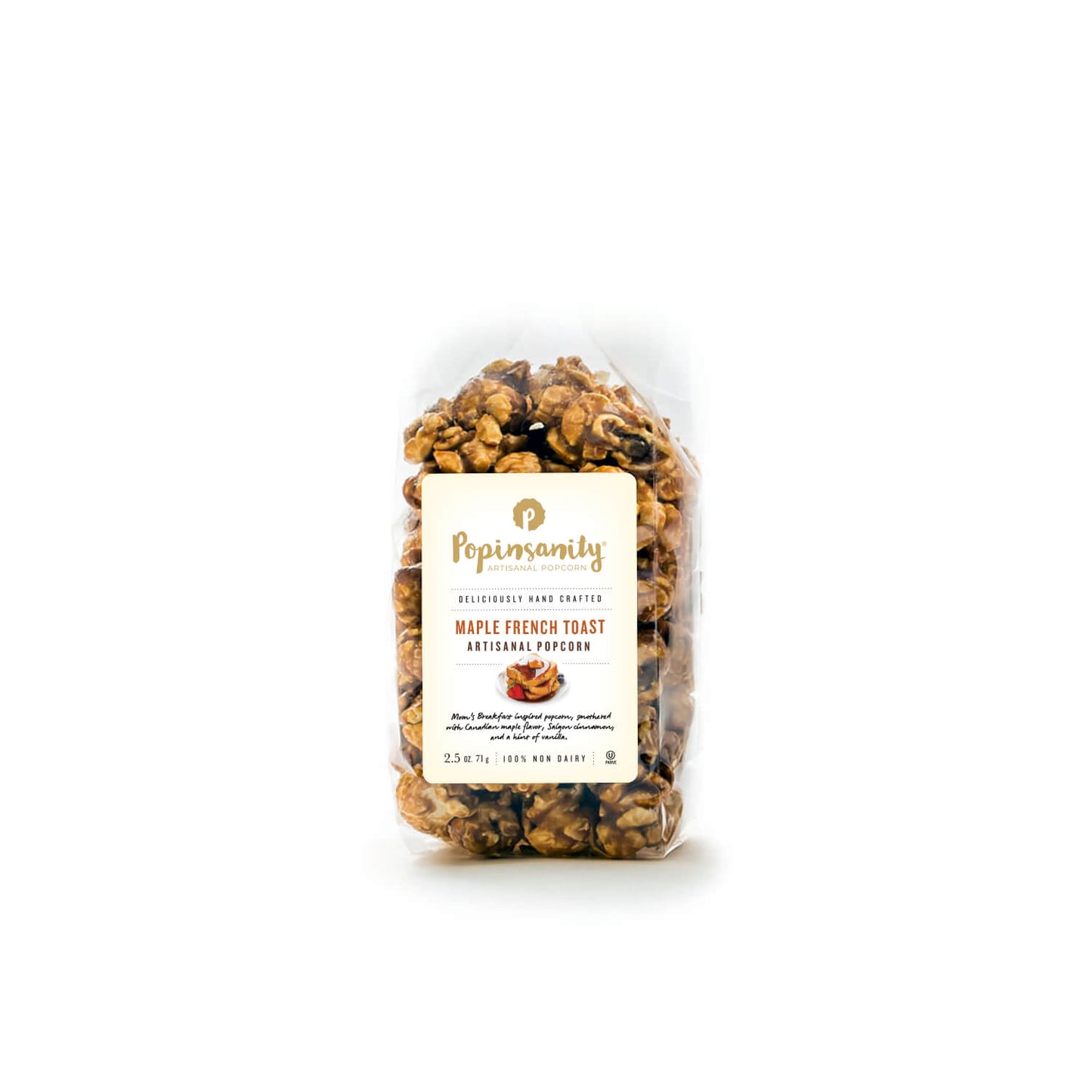 A clear plastic bag of Popinandy Maple French Toast Artisanal Popcorn, showing the golden-brown popcorn pieces inside with a cream-colored label on a white background.