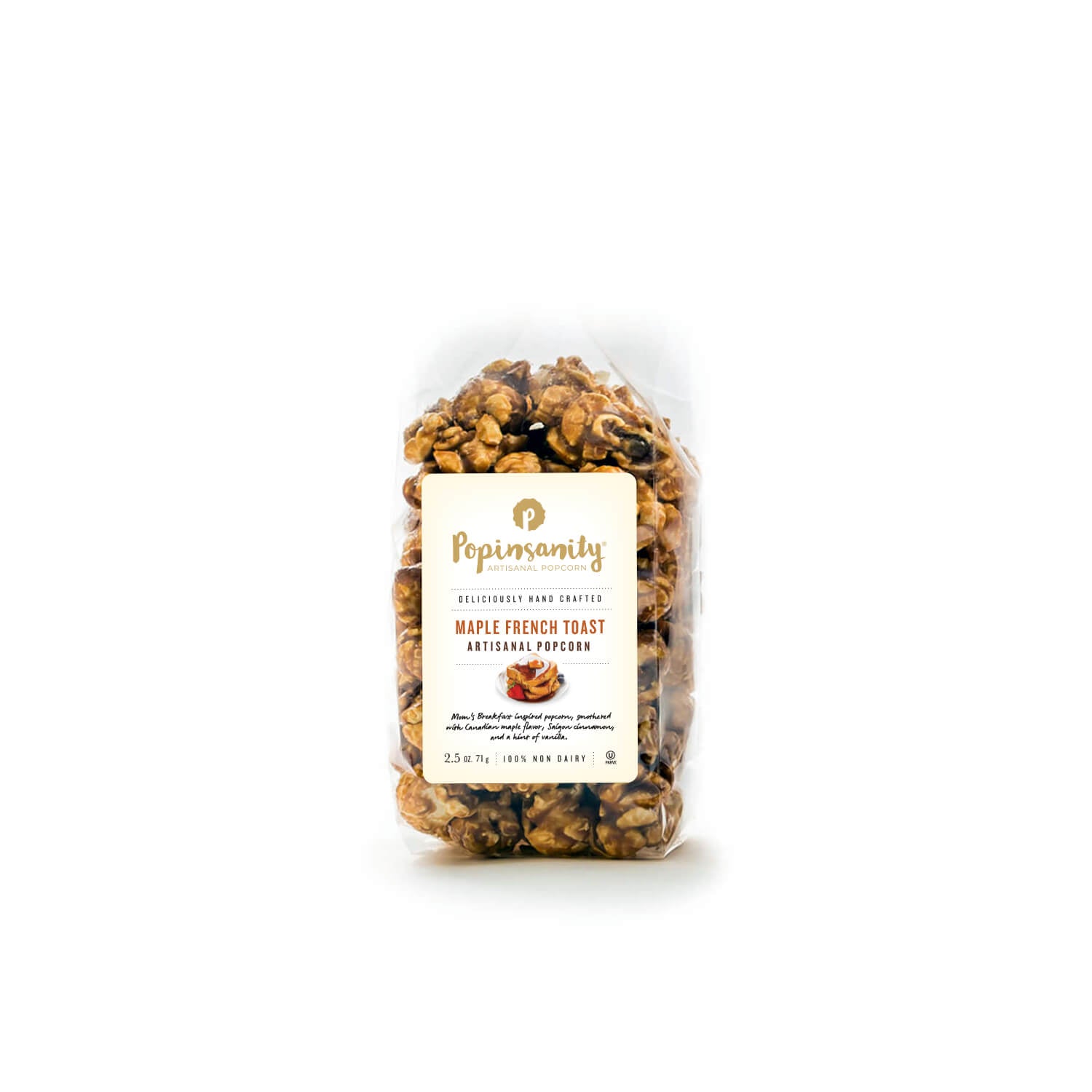 A clear plastic bag of Popinandy Maple French Toast Artisanal Popcorn, showing the golden-brown popcorn pieces inside with a cream-colored label on a white background.